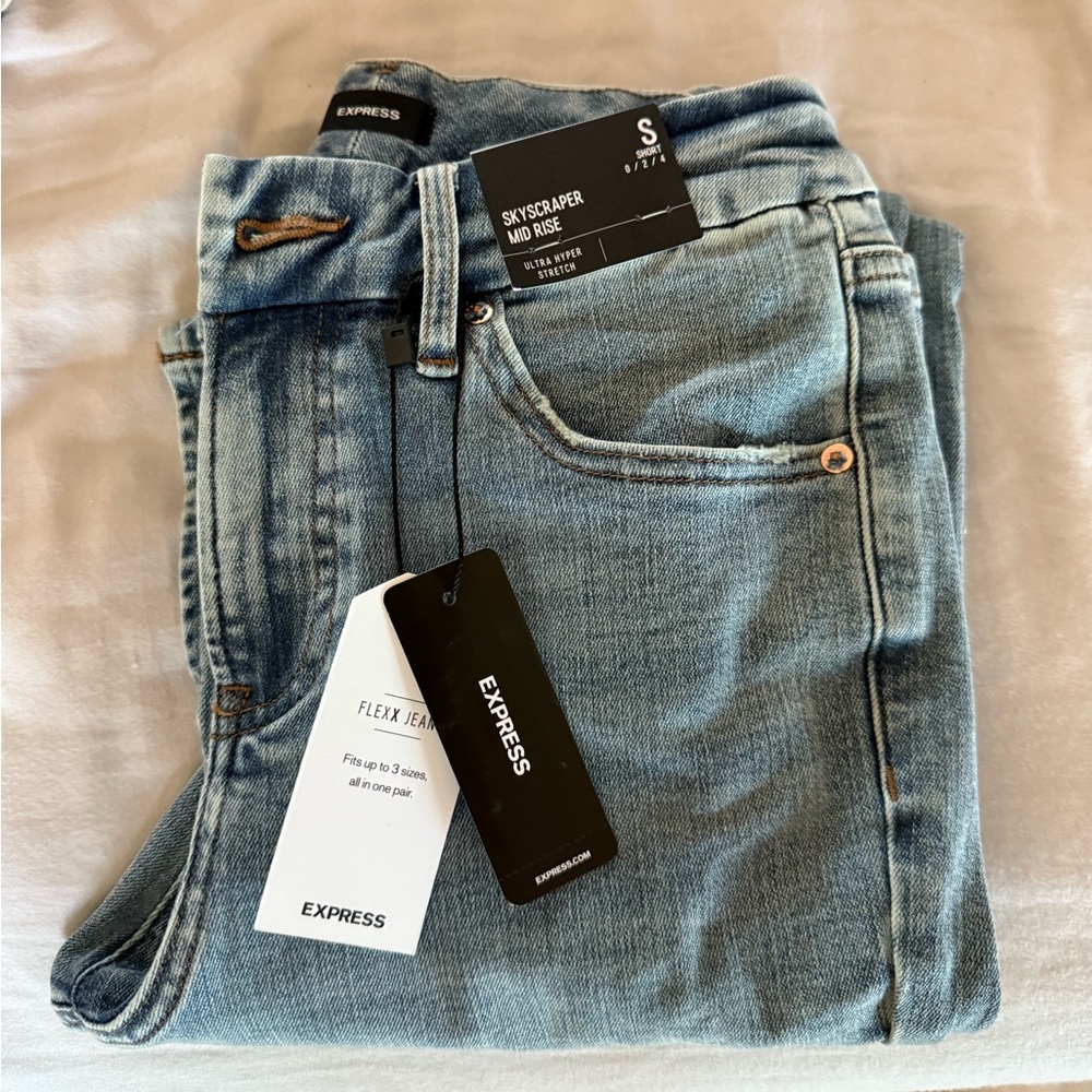 Express Mid Rise (Lighter) Medium Wash FlexX Skyscraper Jeans